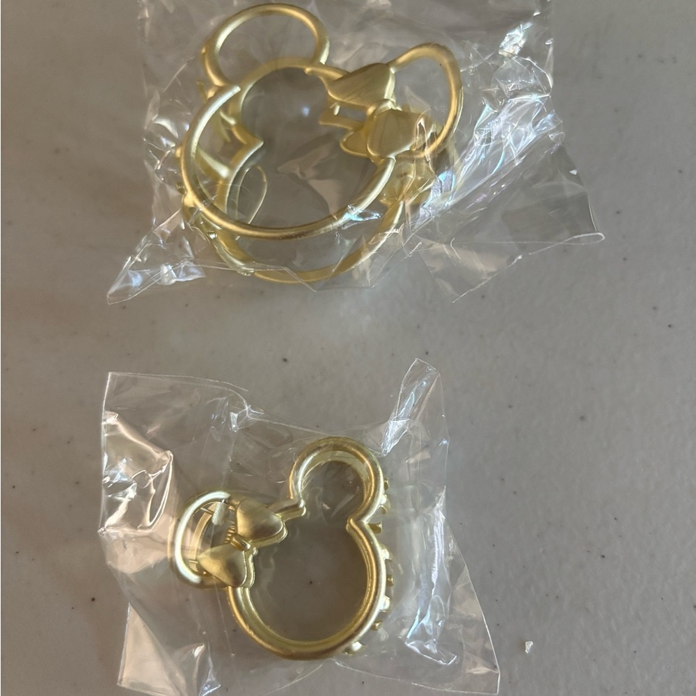 Minnie Mouse hair clips two. Small and a bigger one